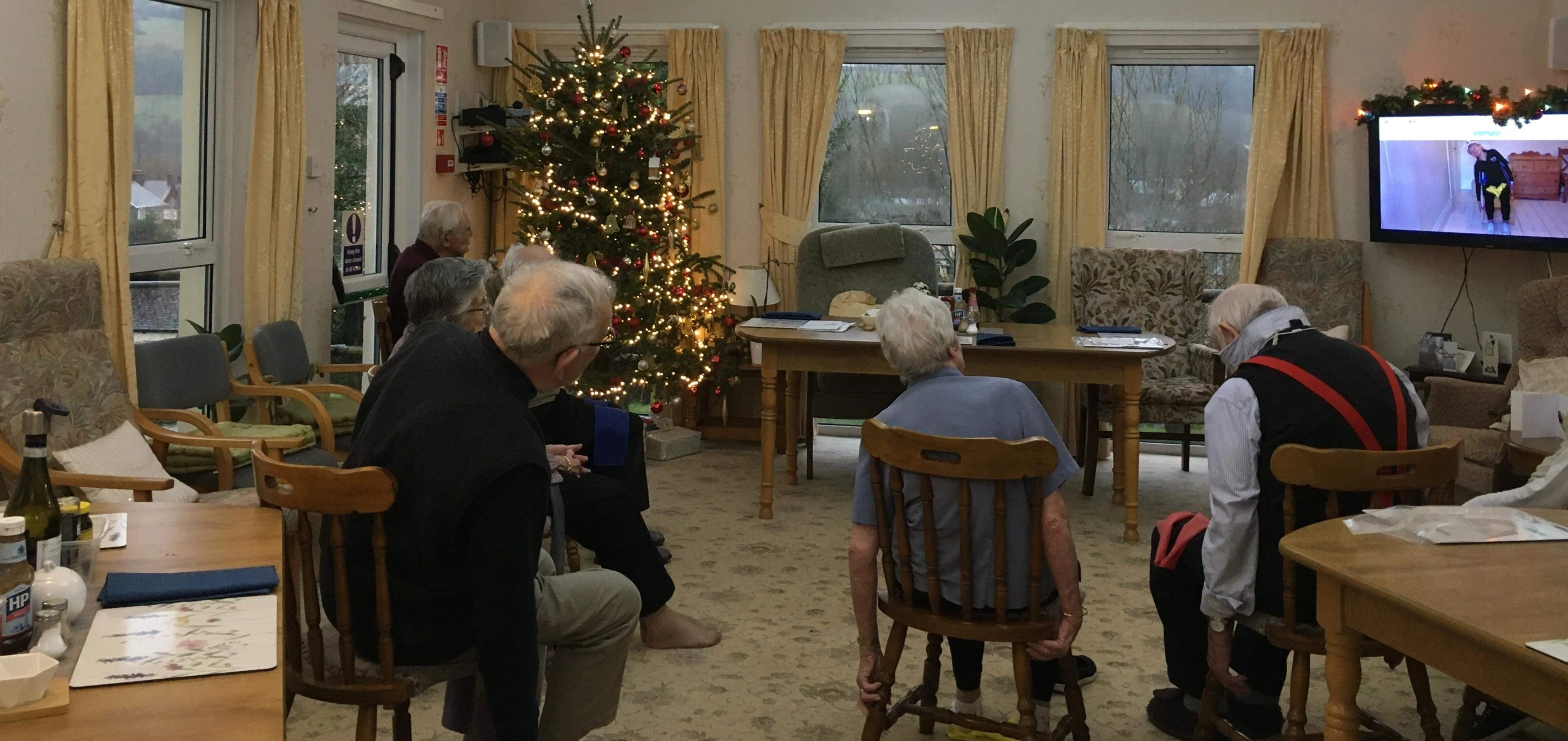 Abbeyfield England Brecon society residents taking part in seated fitness class