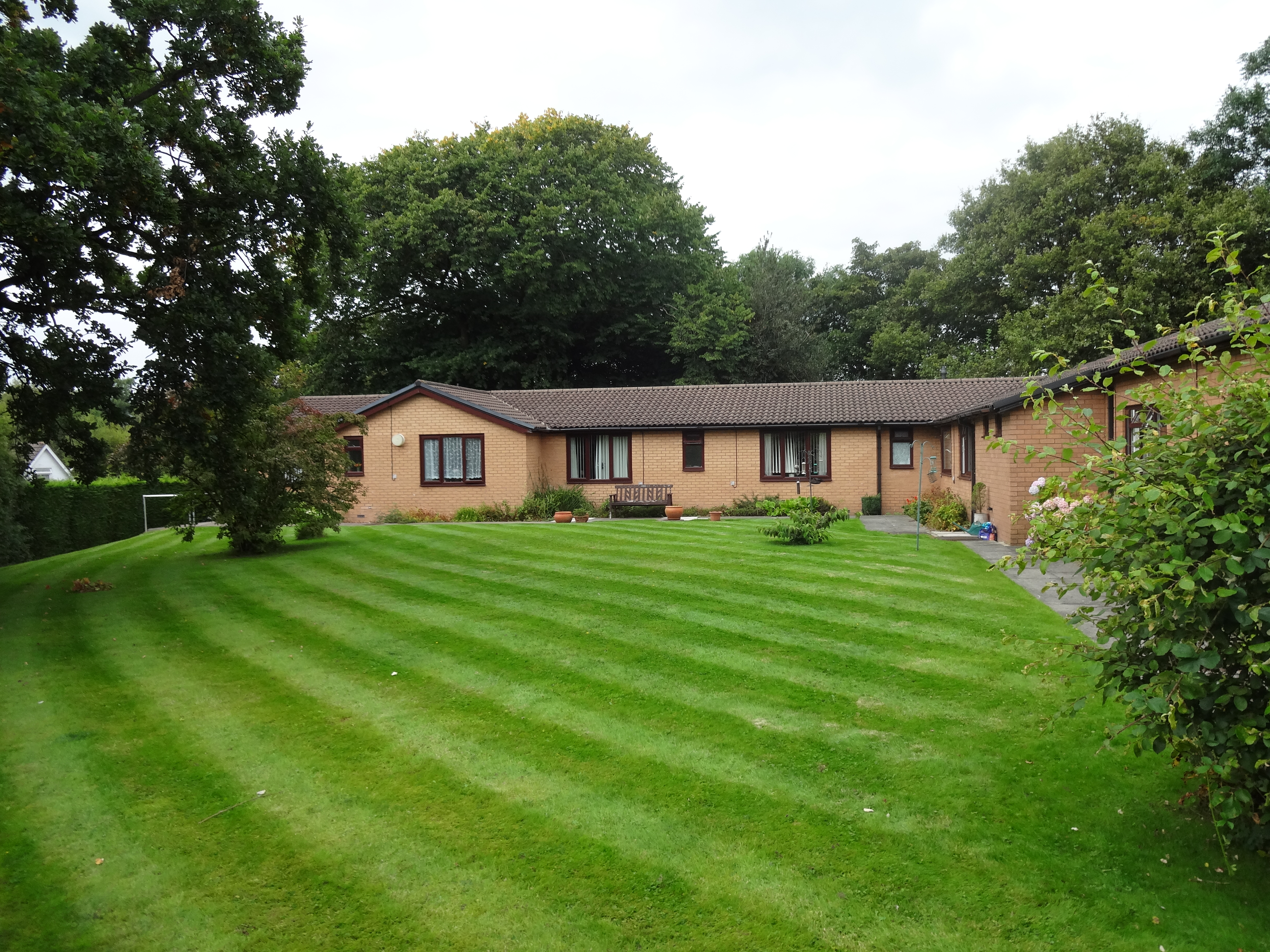 The large well maintained lawn to the rear of the house