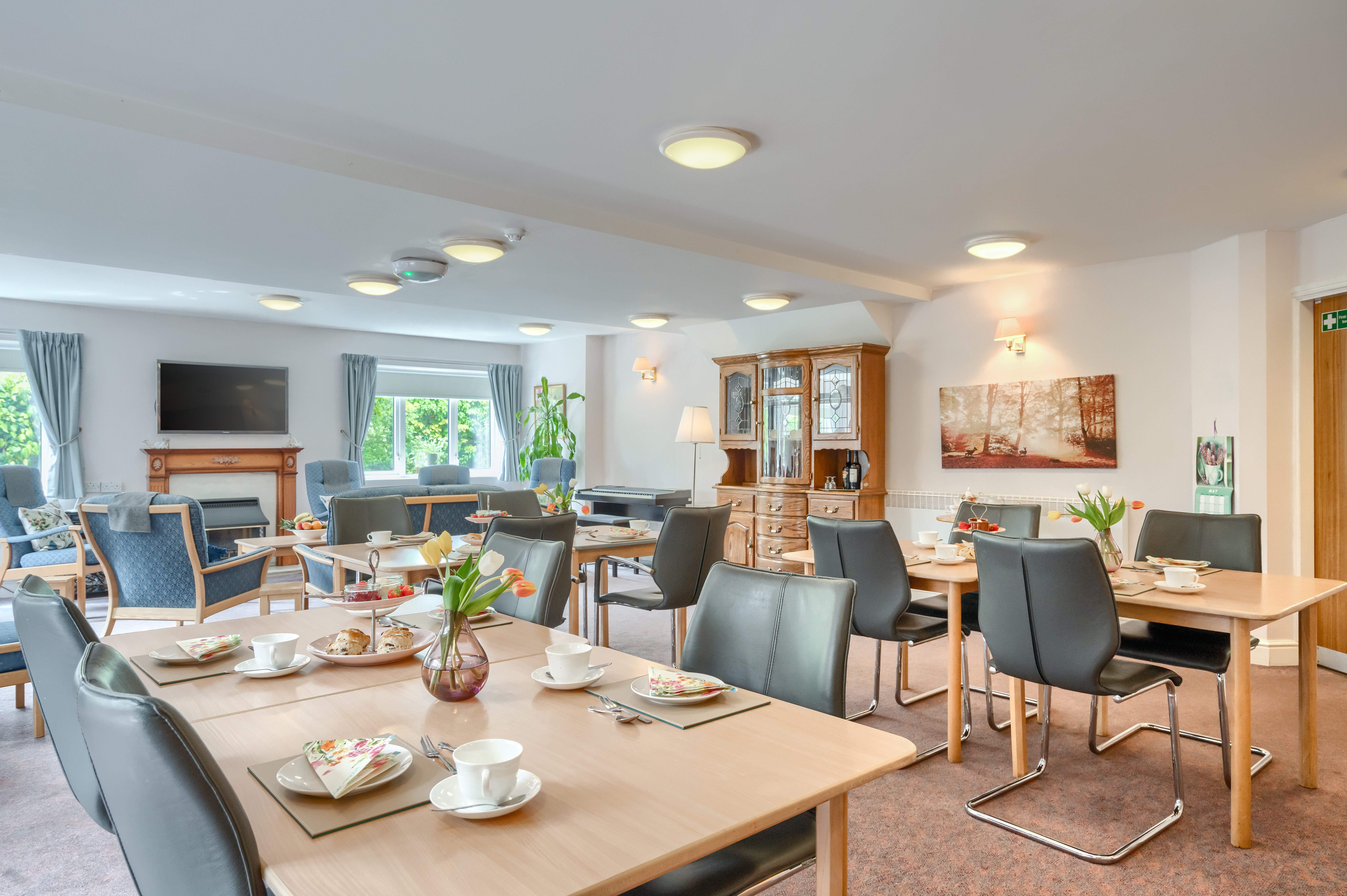 Communal Dining Room With Lounge In Background At Holloway House
