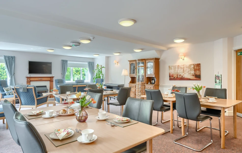 Communal Dining Room With Lounge In Background At Holloway House