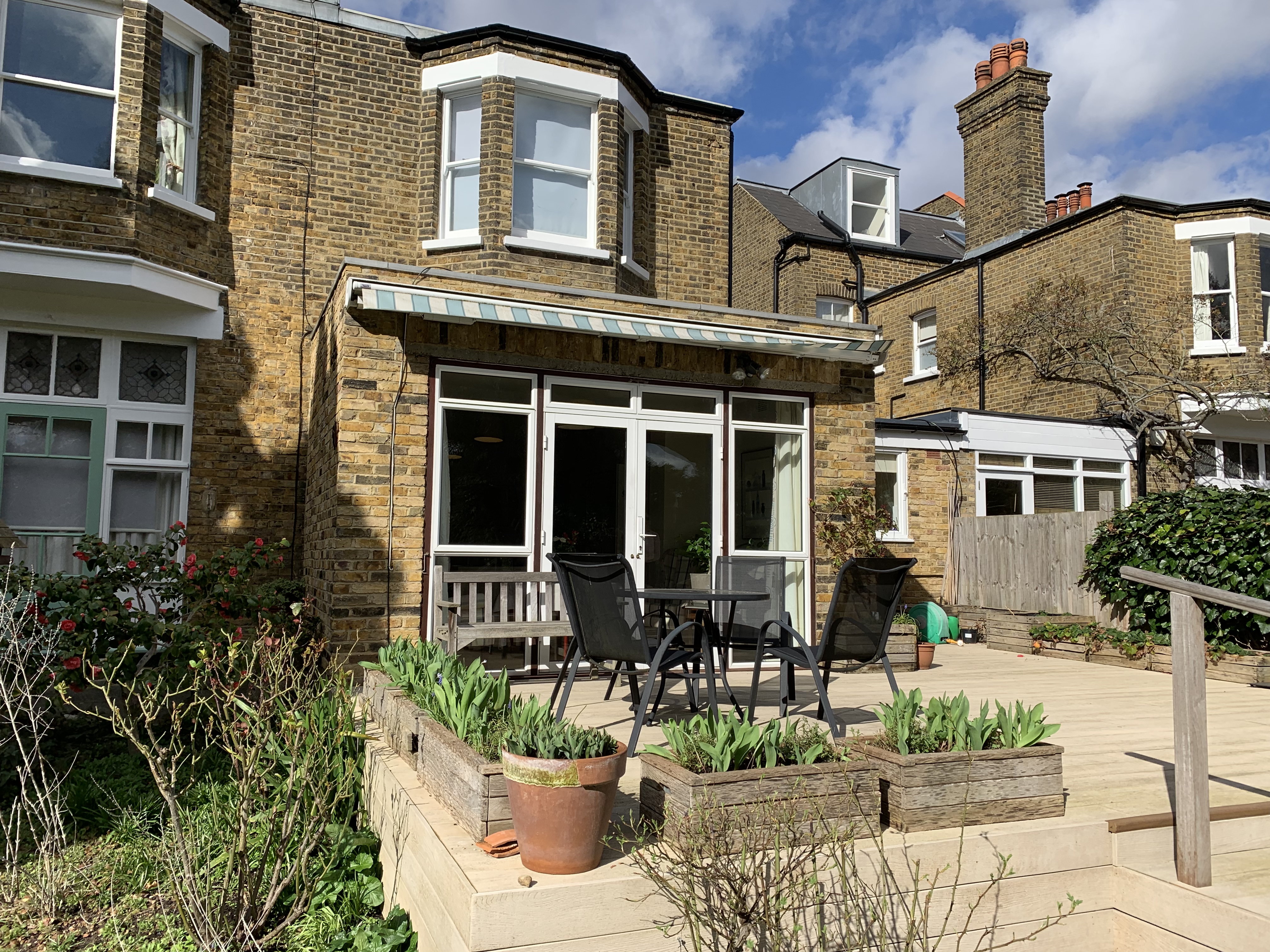 Decking with table and chairs where residents can while away the hours in the sunshine