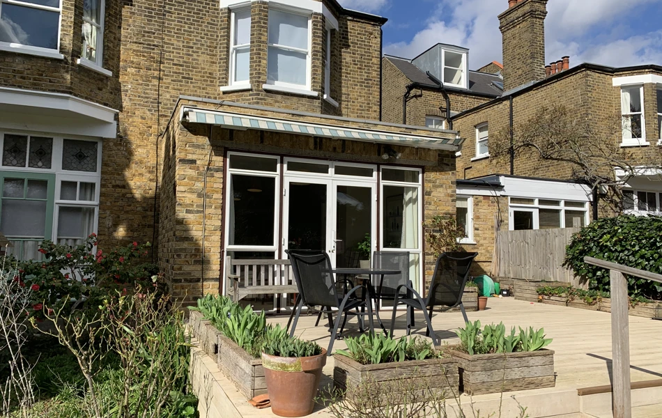 Decking with table and chairs where residents can while away the hours in the sunshine