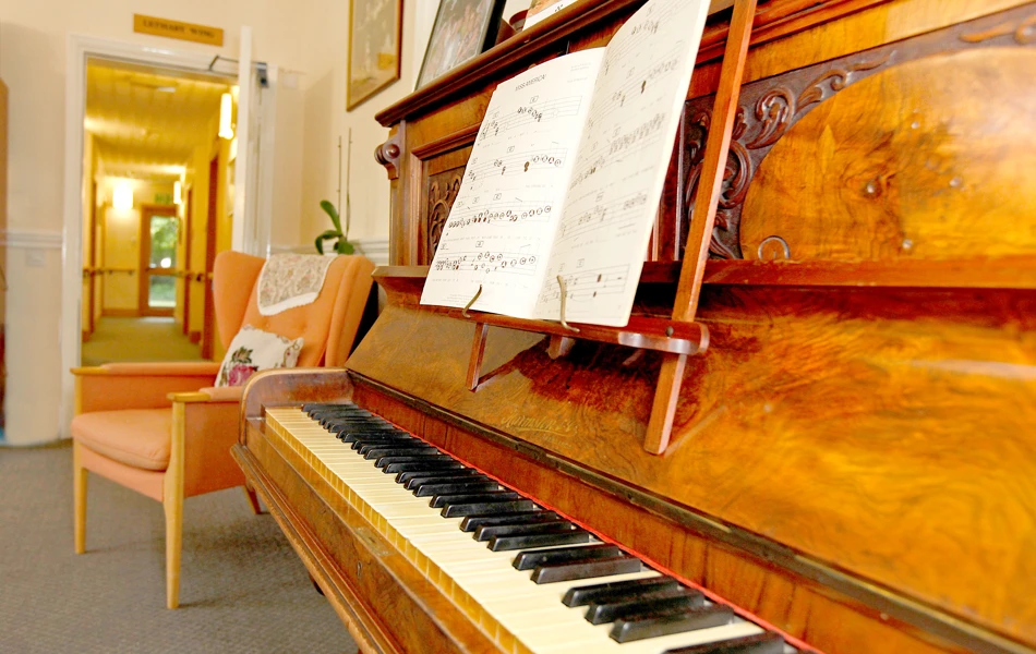 Piano and chair at Hill House