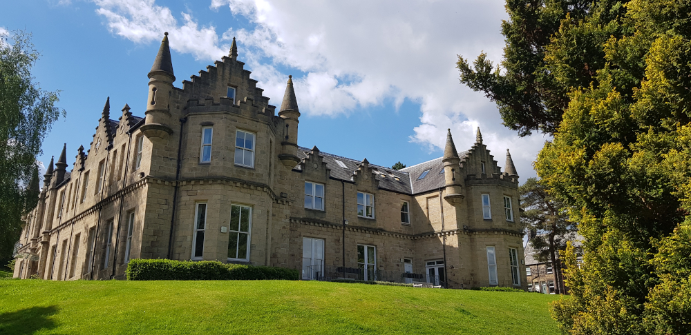 Rear view of the stunning Grove House from its gardens