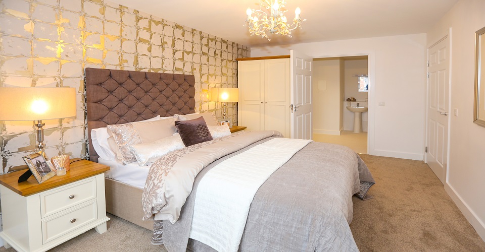 Warmly decorated luxury bedroom with chandelier