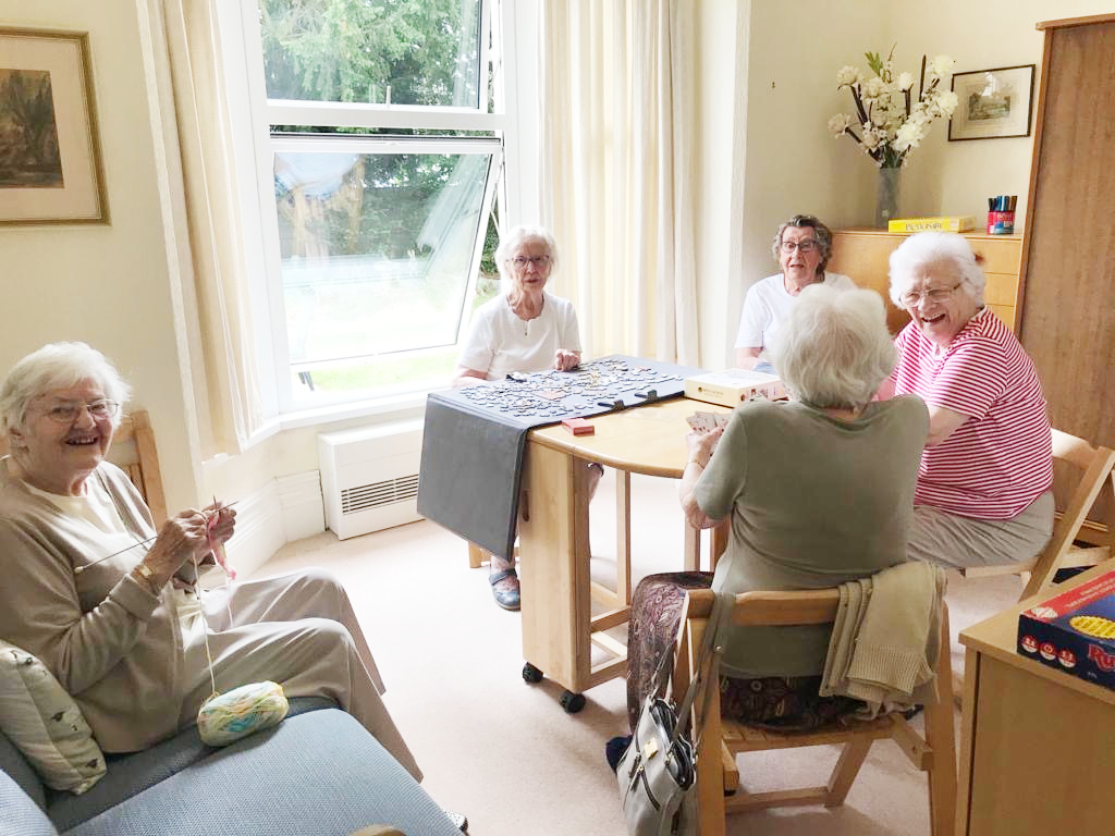 Residents enjoying card games together