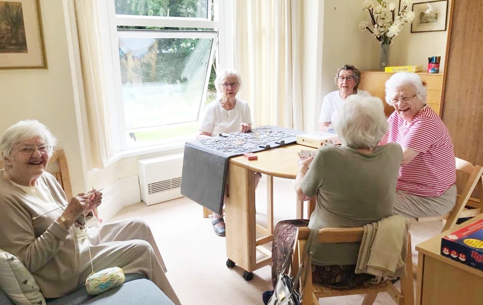 Residents enjoying card games together