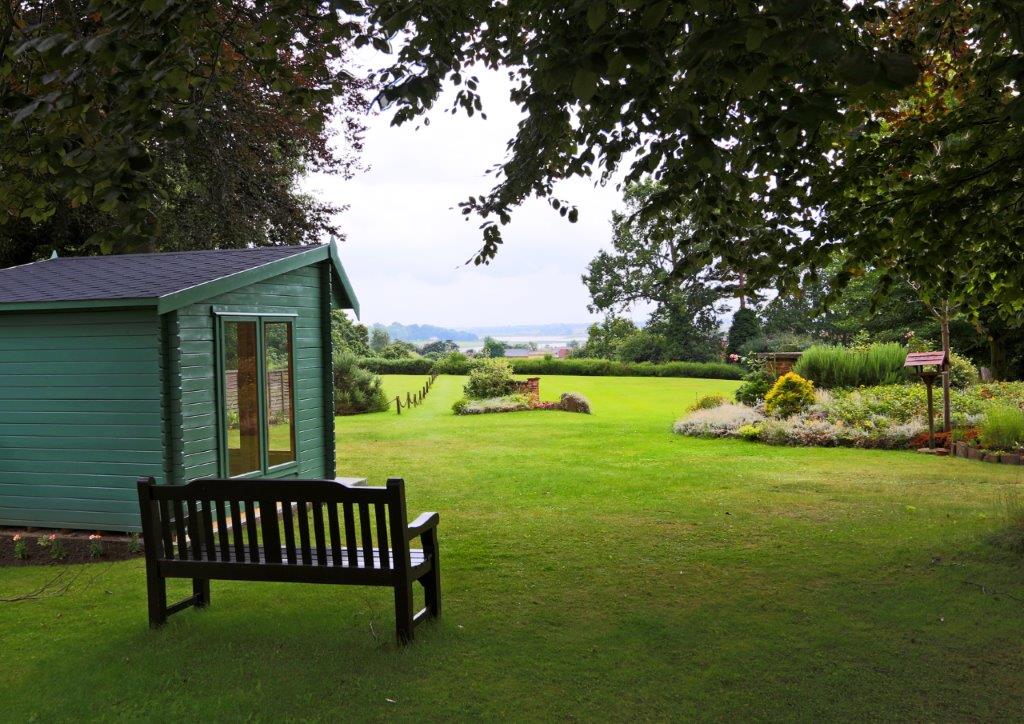 View across rear lawn at Highlands Care Home, Woodbridge IP12 1EN