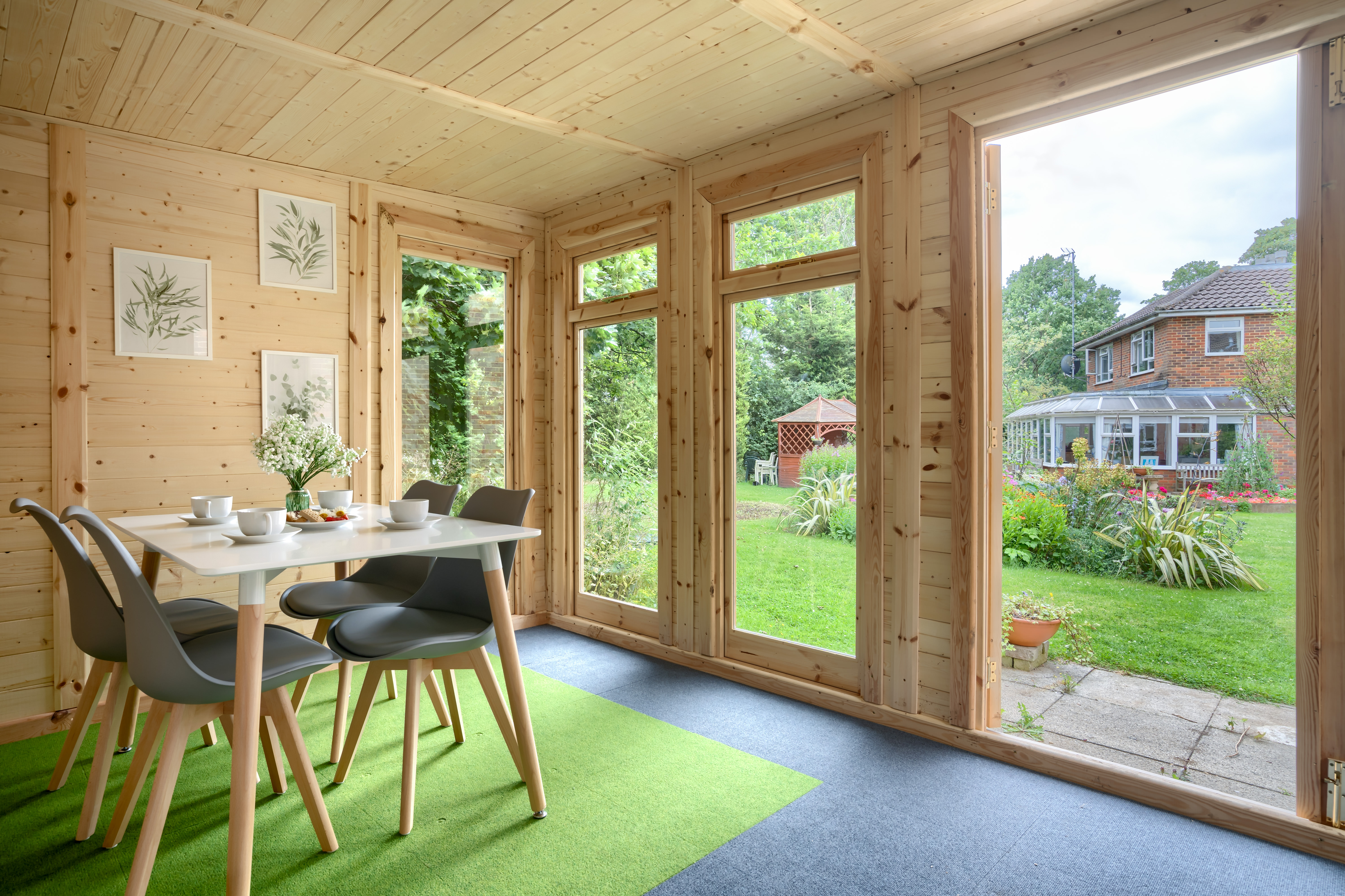 Pratt House summer house with table and chairs