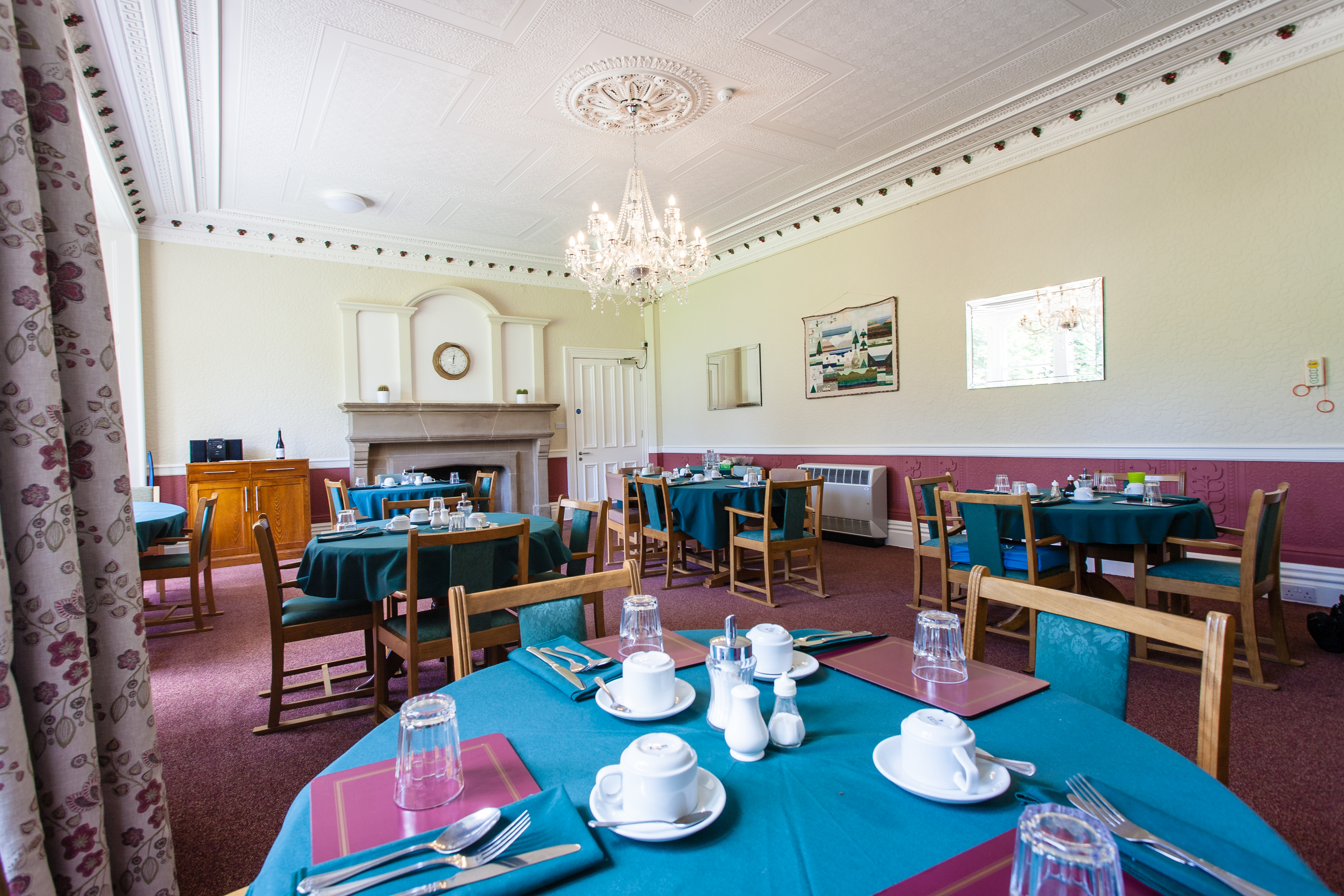 Dining area with blue table clothes