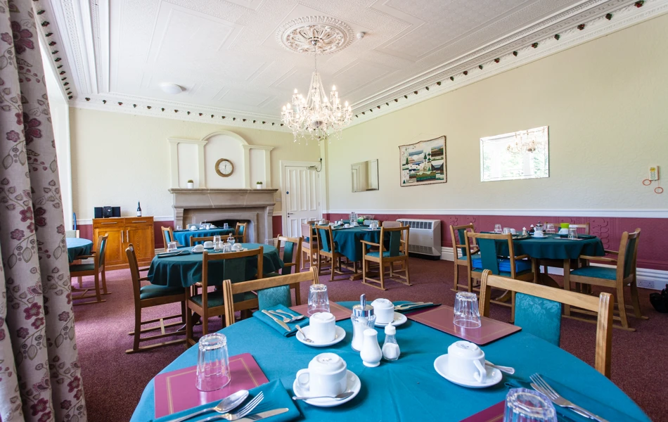 Dining area with blue table clothes