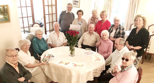 Residents sat together around a table