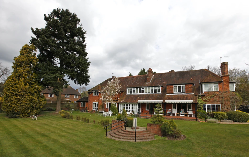 Lovely spacious garden where residents can relax and enjoy a breath of fresh air at Abbeyfield, Austenmead