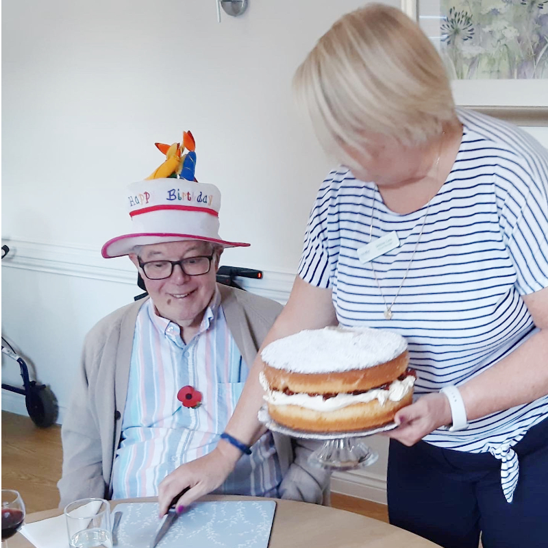 Resident Celebrating Birthday At Harleston House