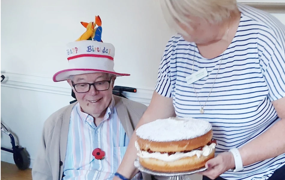 Resident Celebrating Birthday At Harleston House