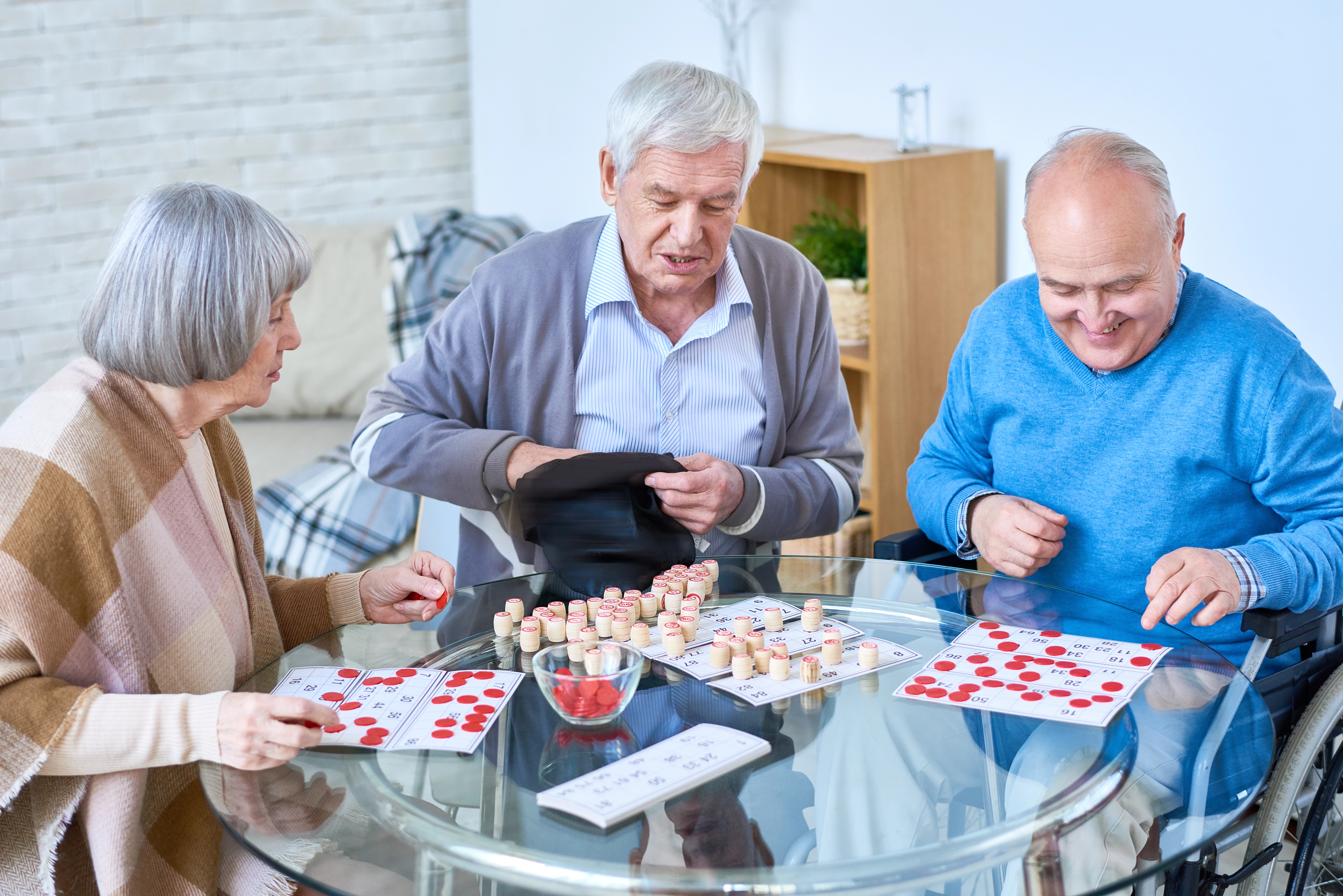 Group Of Older People Playing Bingo