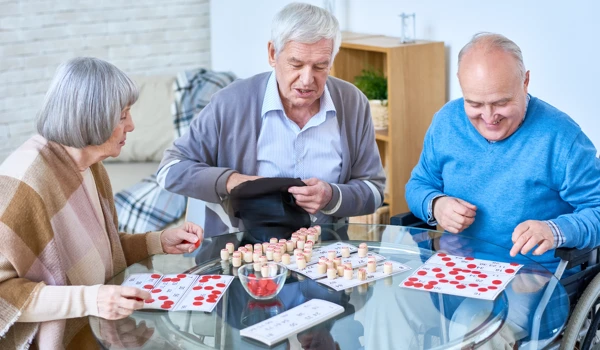Group Of Older People Playing Bingo