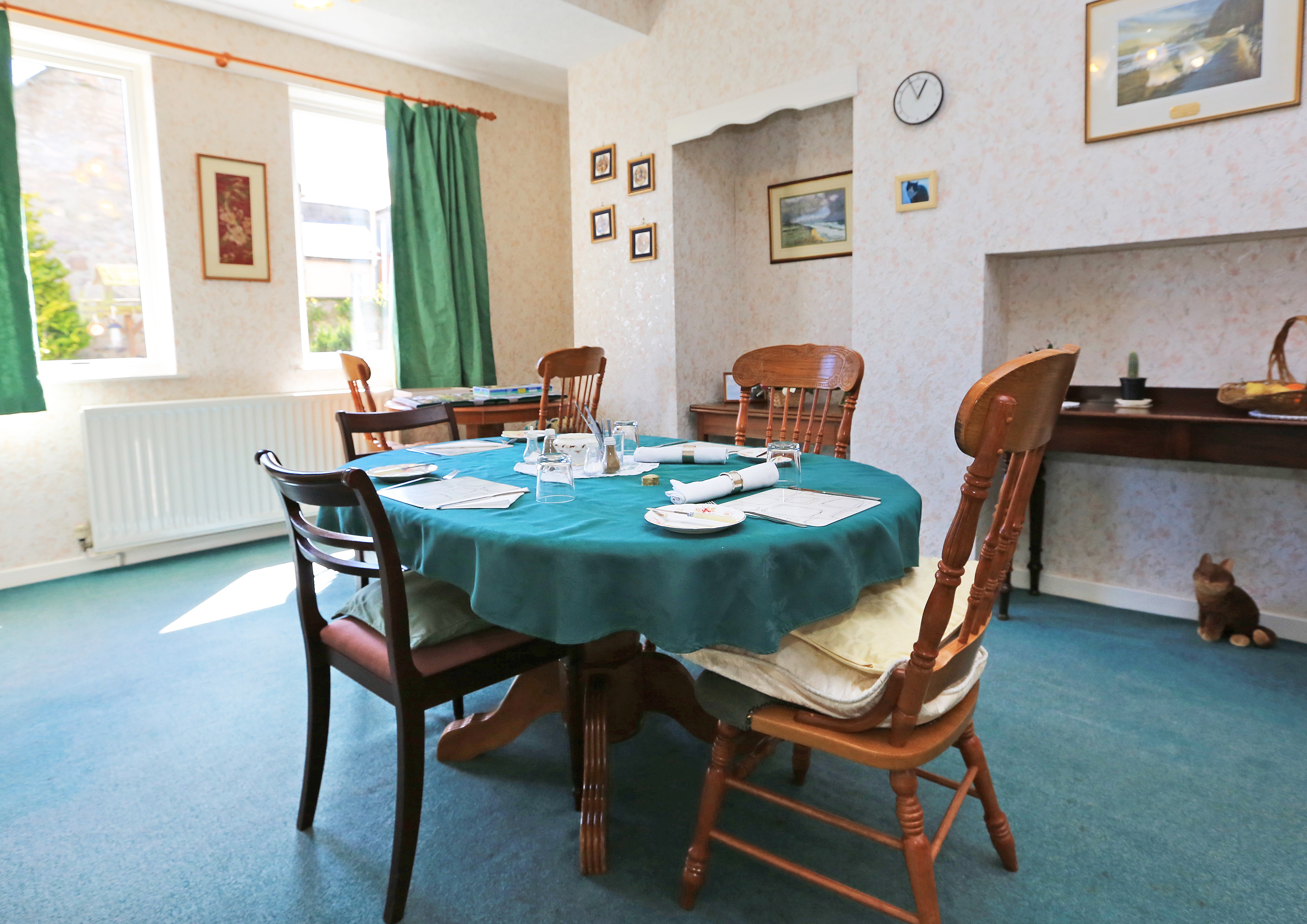 A dining table set for dinner