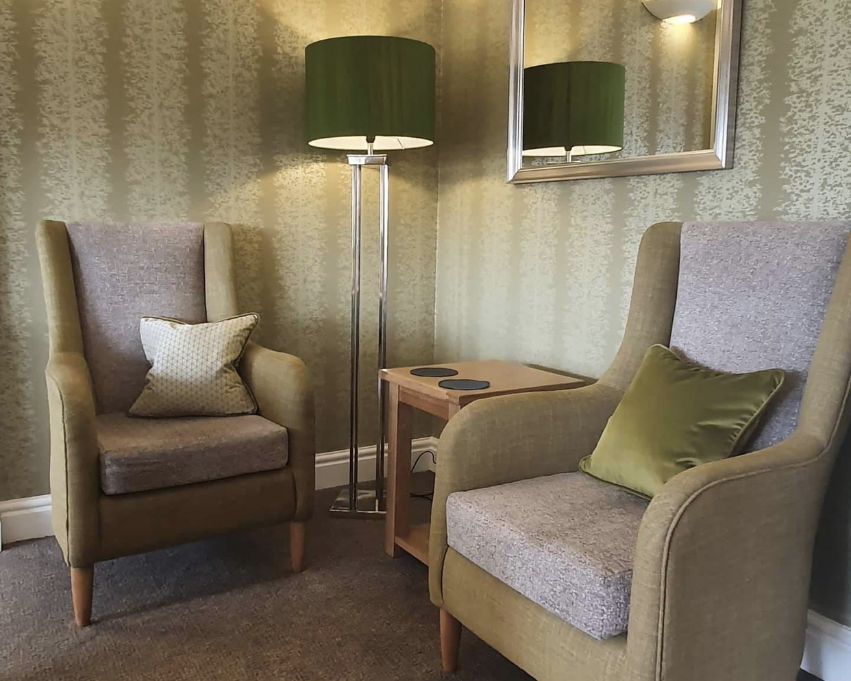 Two chairs in the lounge of Abbeyfield House, Garstang PR3 1PA.jpg