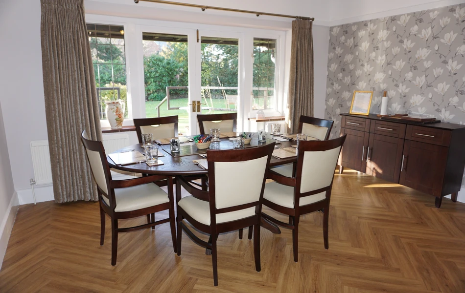 Bright Communal Dining Room Where Residents Share Mealtimes Together At Abbeyfield, Austenmead