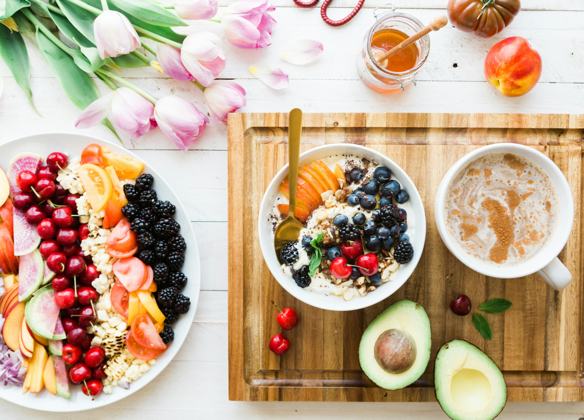 Healthy Breakfast Spread With Bowl Of Oats, Plenty Of Fruits, And A Spiced Drink