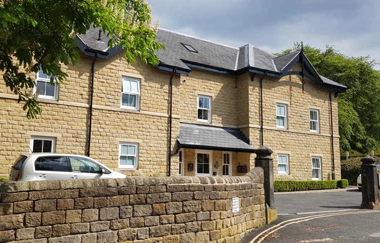 Front view of Abbeyfield House, a beautiful built stone house in Ikley, West Yorkshire