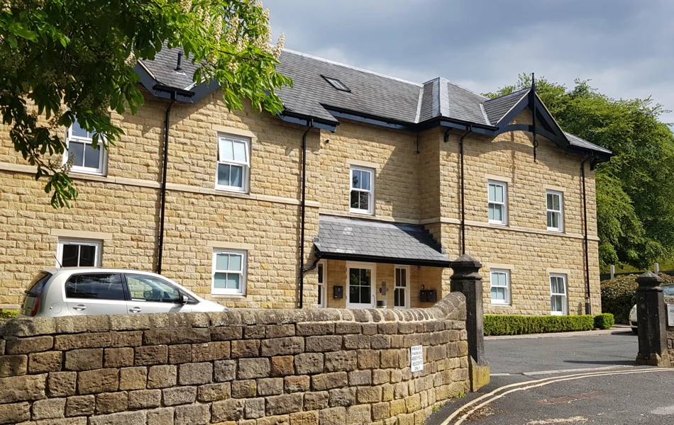 Front view of Abbeyfield House, a beautiful built stone house in Ikley, West Yorkshire