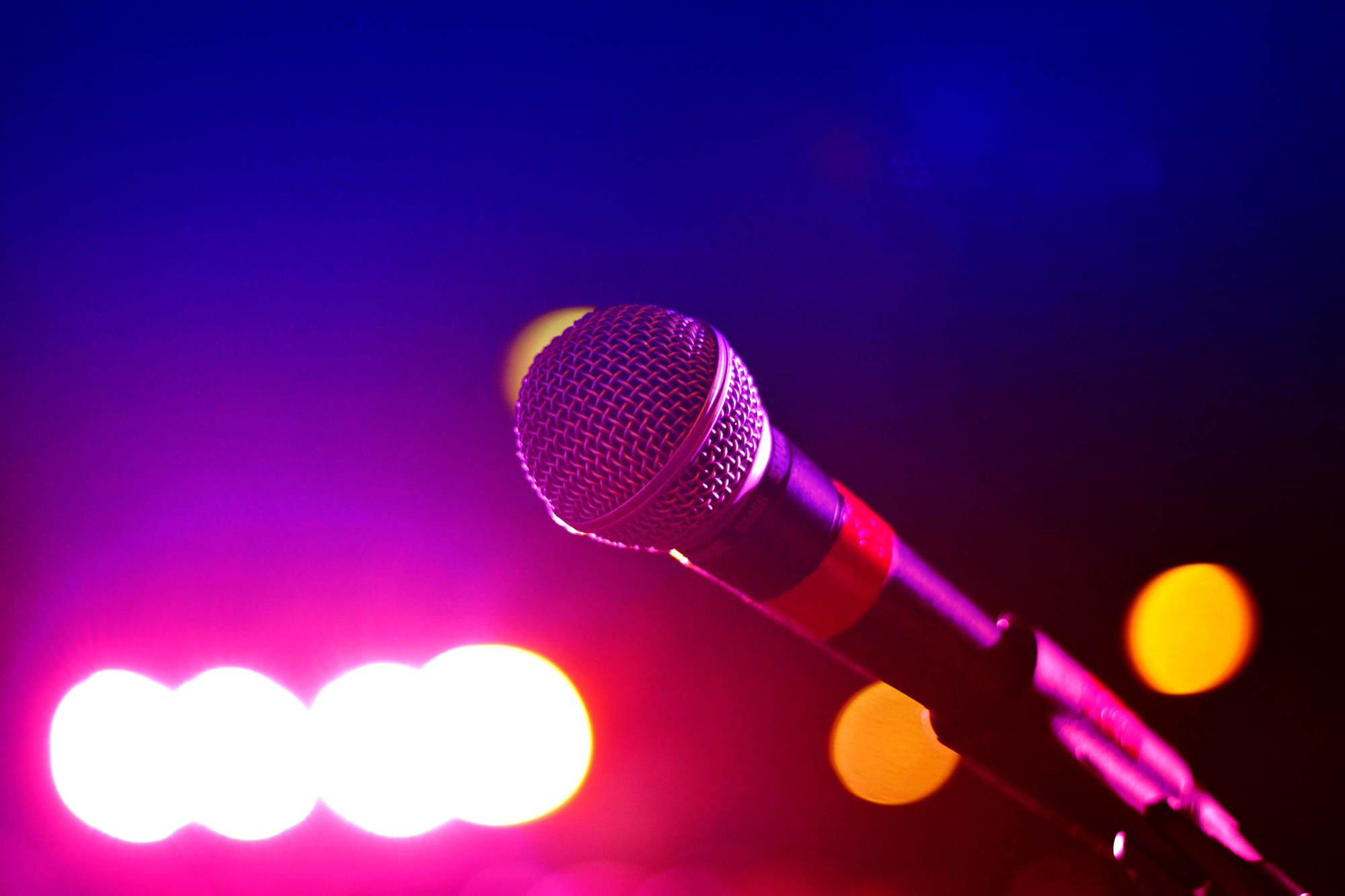 Microphone With Lights In The Background