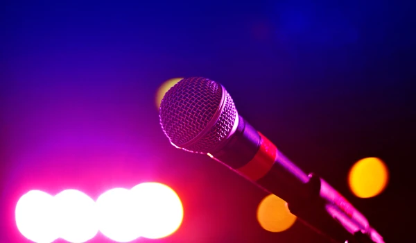 Microphone With Lights In The Background