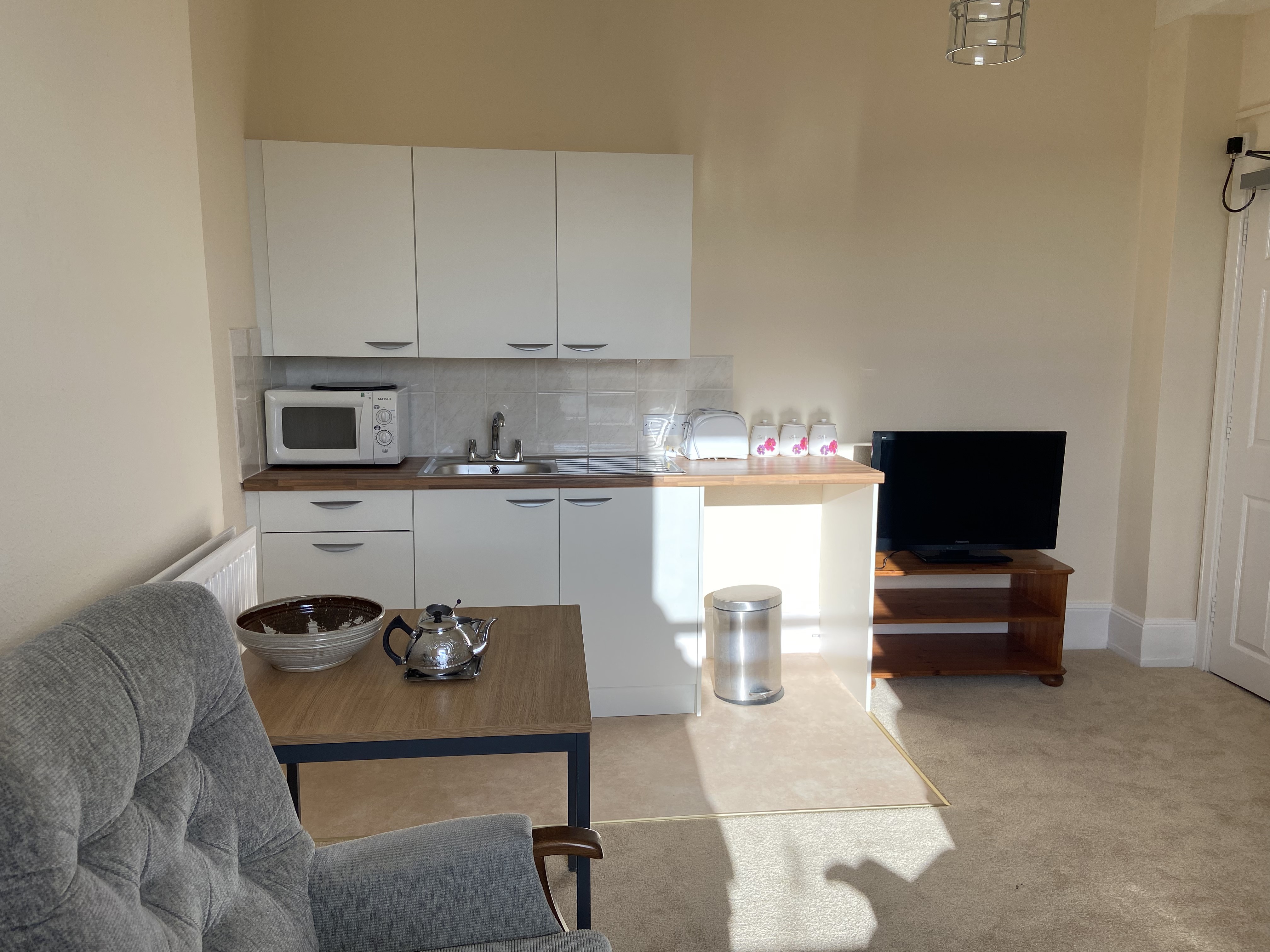 The kitchen area of one of our single rooms