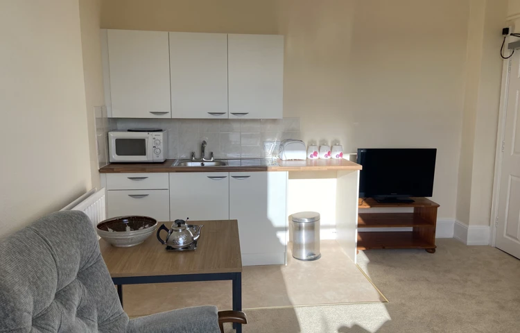 The kitchen area of one of our single rooms