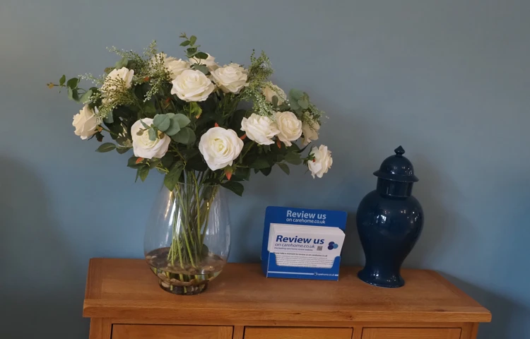 Flowers in reception, Friars Mead, WD4 8DR