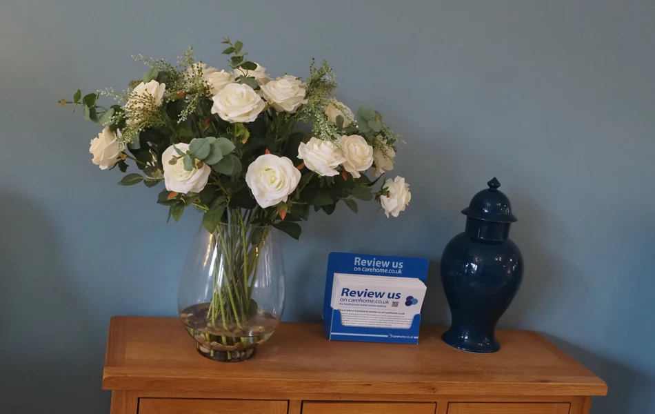 Flowers in reception, Friars Mead, WD4 8DR