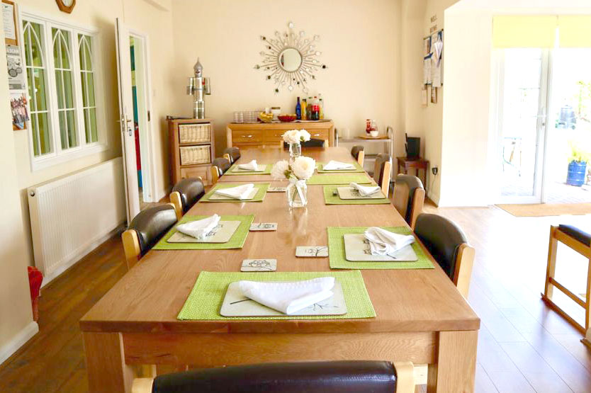 Beautiful and bright dining room where residents come together to share mealtimes