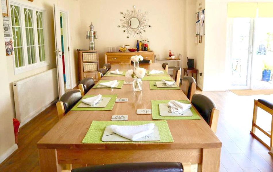 Beautiful and bright dining room where residents come together to share mealtimes
