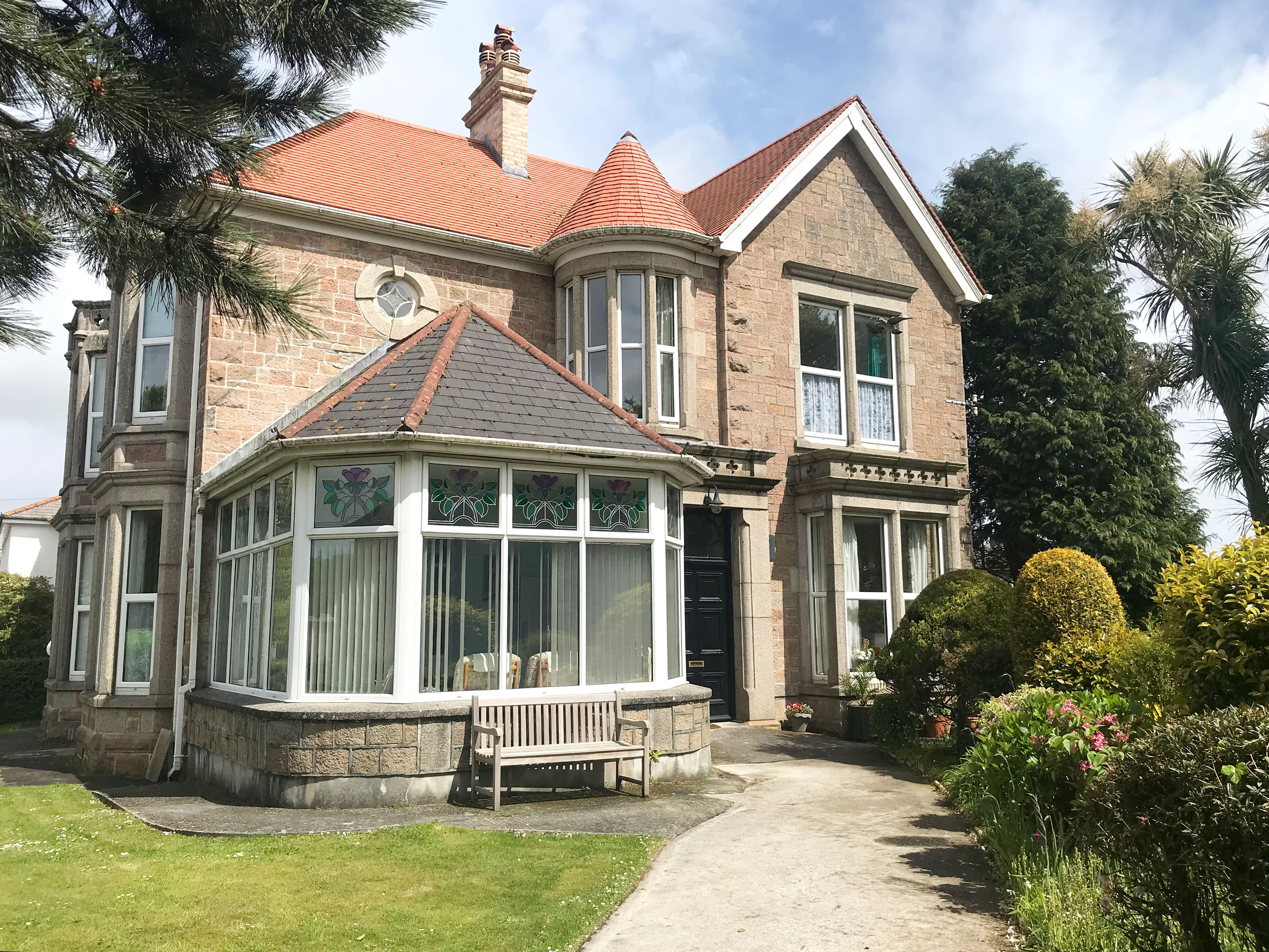 Teveor House has many of its original features such as the tiled entrance and stained glass windows