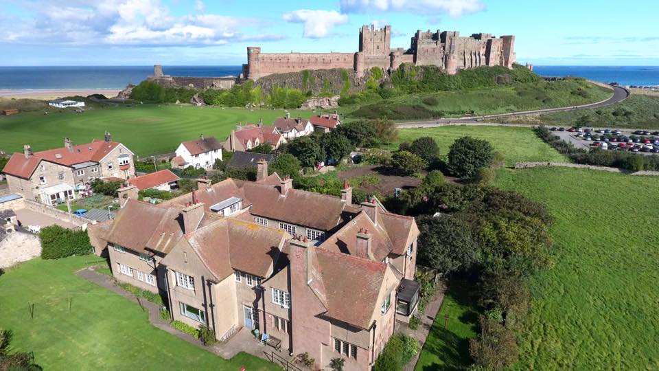 The beautiful village of Bamburgh with the castle in the distance