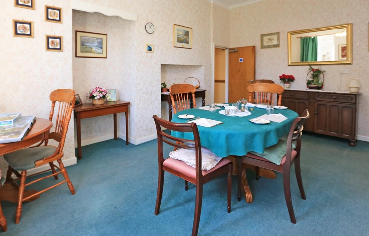 The dining area with tables set for dinner (1)