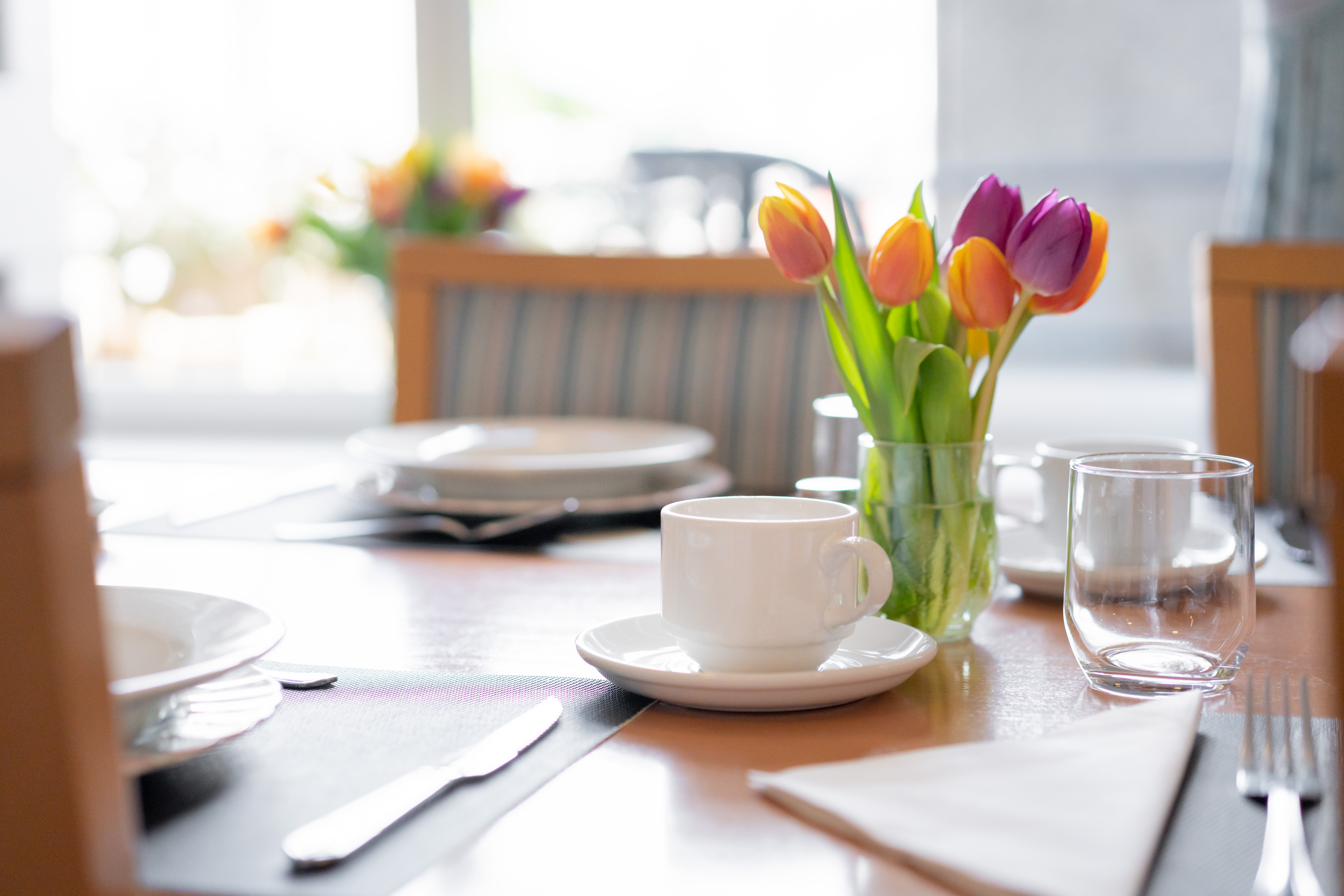 Fresh Tulips On The Dining Table At Abbeyfield House