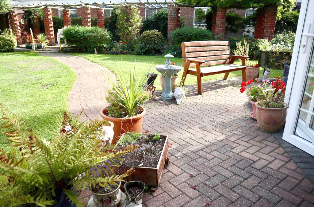 Patio area in the garden where residents can sit and enjoy the sunshine