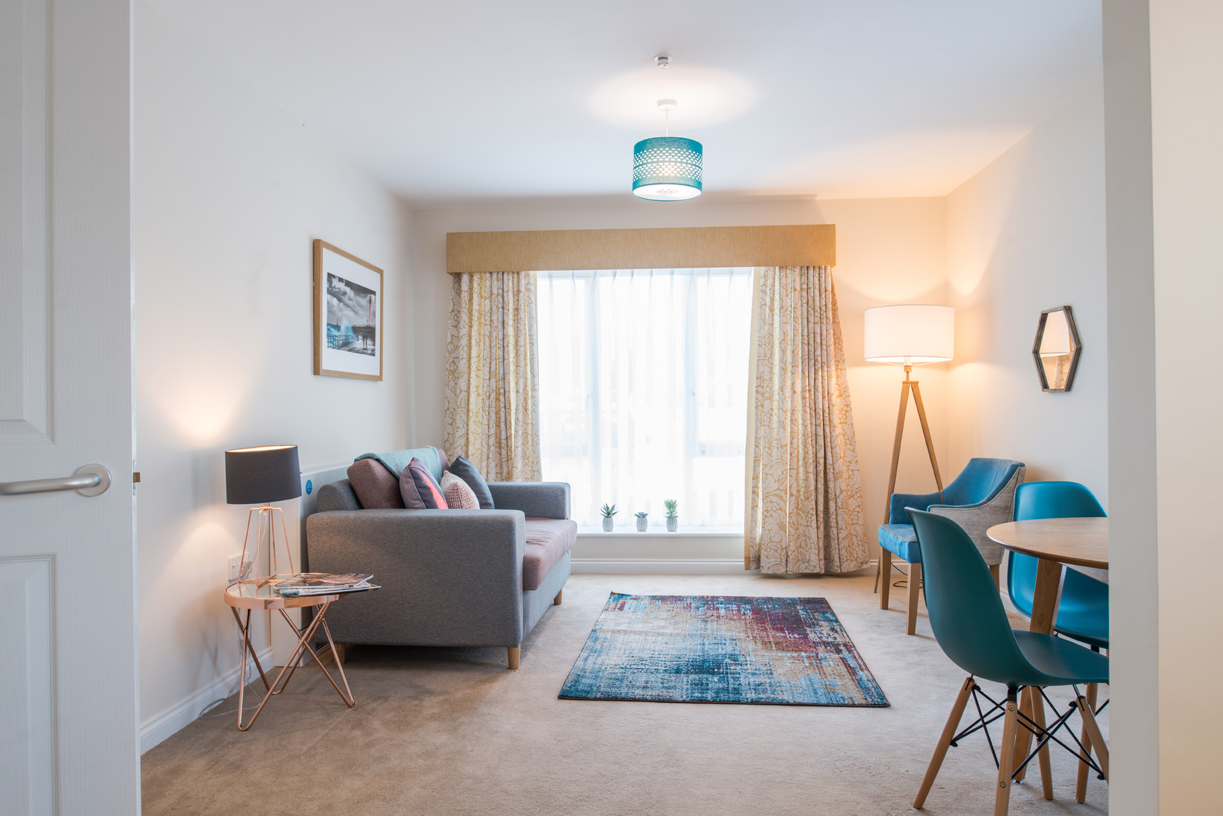 A bright tastefully decorated living room at Hope Bank View