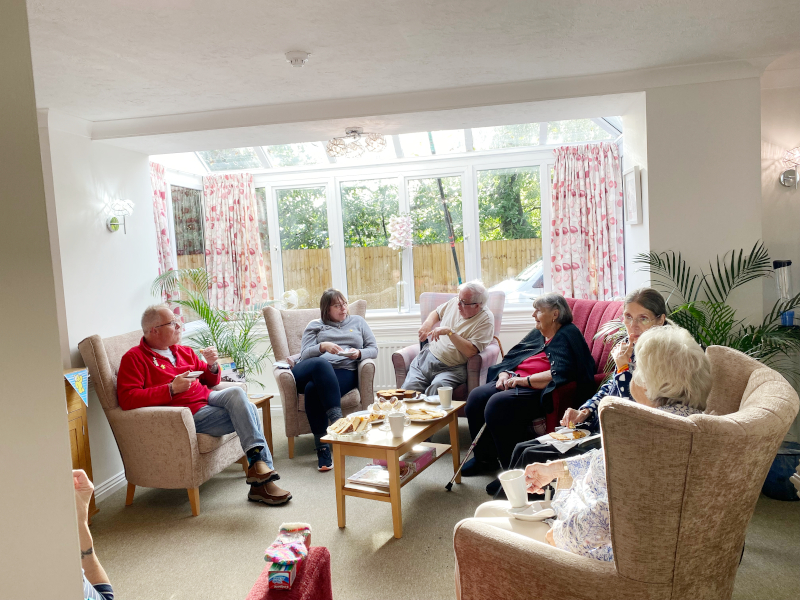 Harleston House Residents Enjoy Spending Time Together Socialising In The Communal Lounge