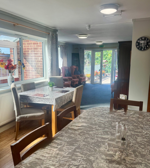 View From The Dining Room At Abbeyfield House Showing The Communal Lounge And Garden