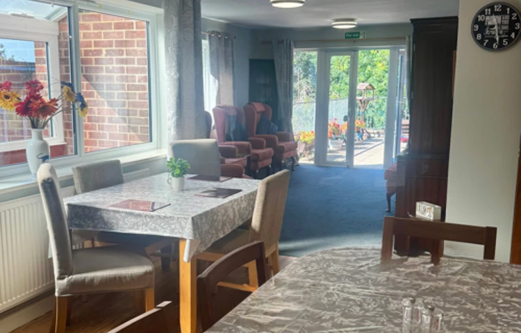 View From The Dining Room At Abbeyfield House Showing The Communal Lounge And Garden
