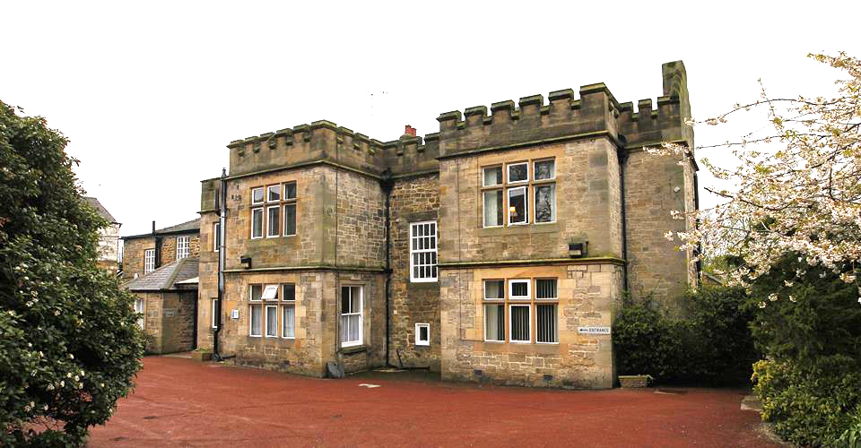 A photo of the castle-like house