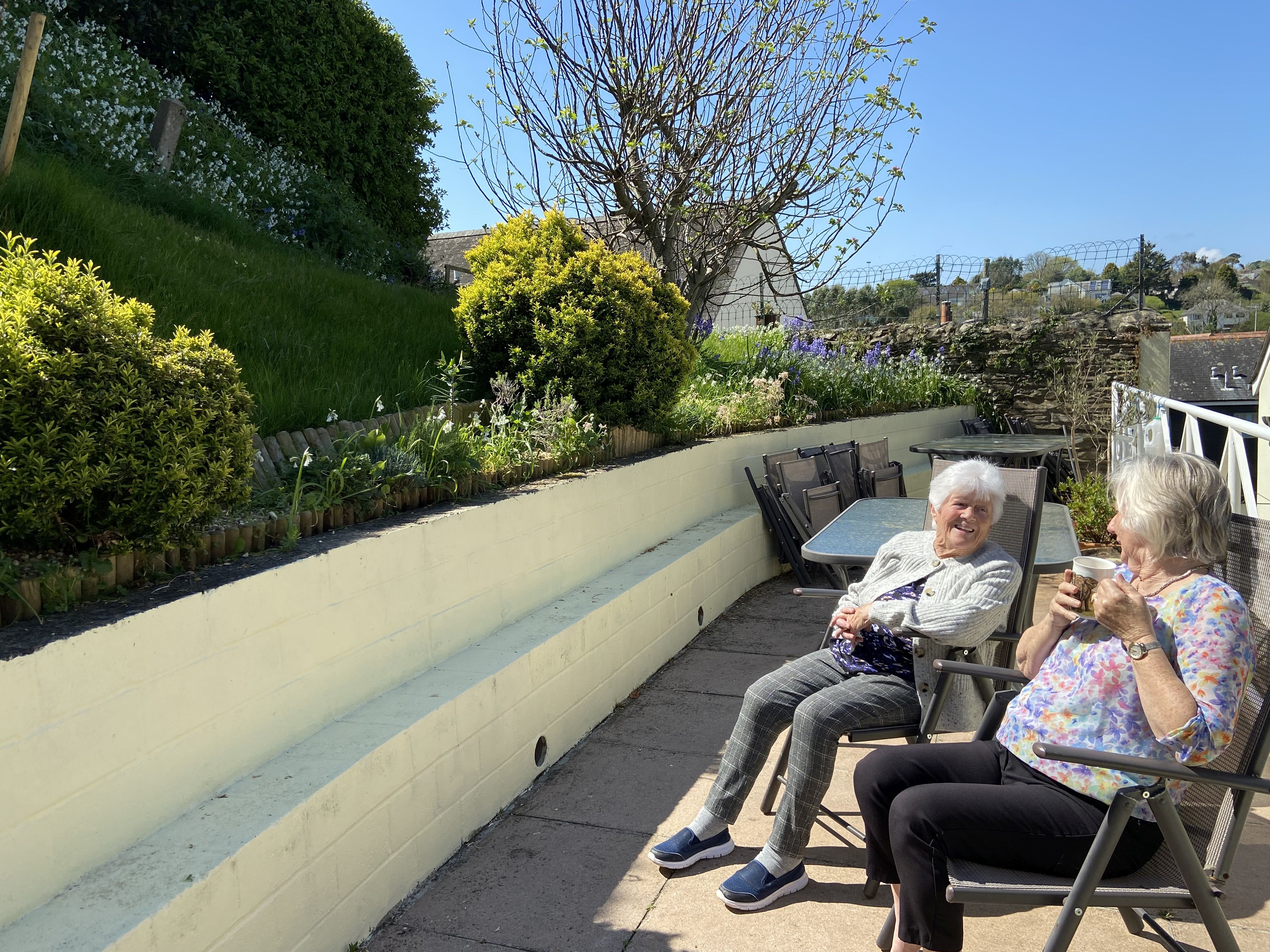 Residents enjoying the sunshine at Abbeyfield House, Kingsbridge TQ7 1RL