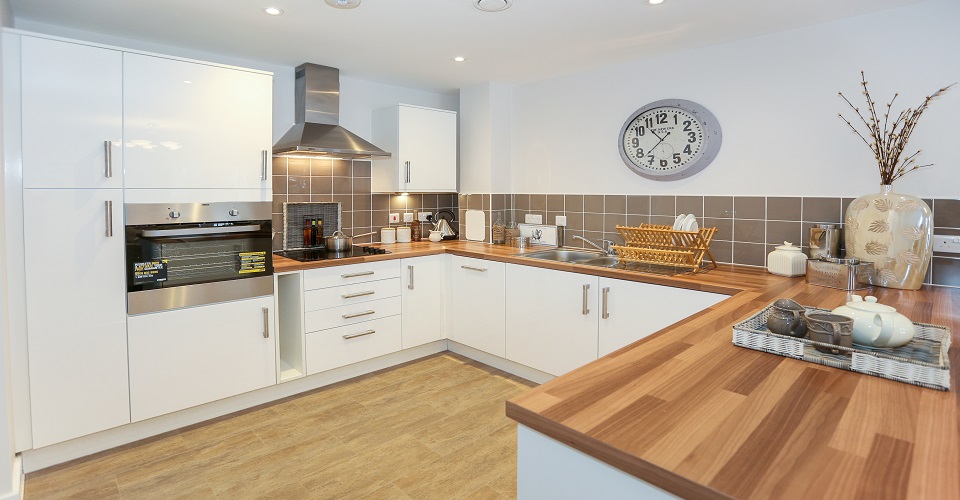 Modern white kitchen in one of our apartments