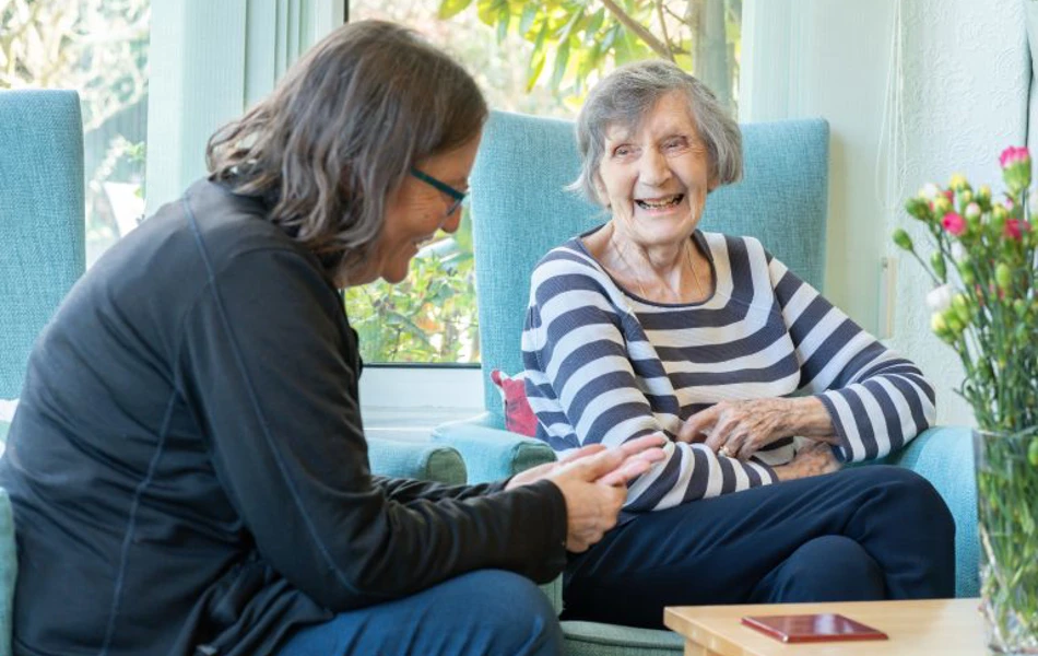Staff Member And Resident Enjoying Time Together on Roundhay, GU1 2JH