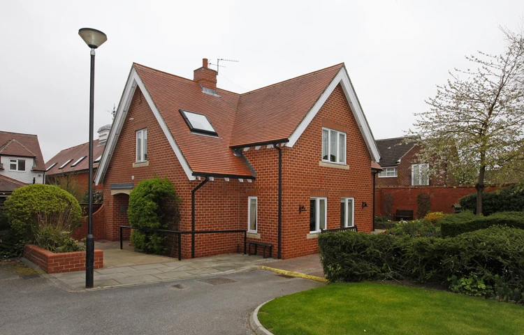 The front of Earl Keelan House DL3 8PD with a lamp post outside Earl Keelan House
