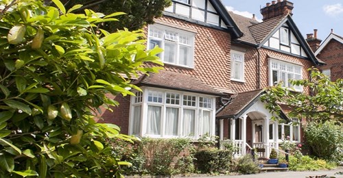 Sunny exterior of the entrance of Abbeyfield House, Reigate RH2 9DZ